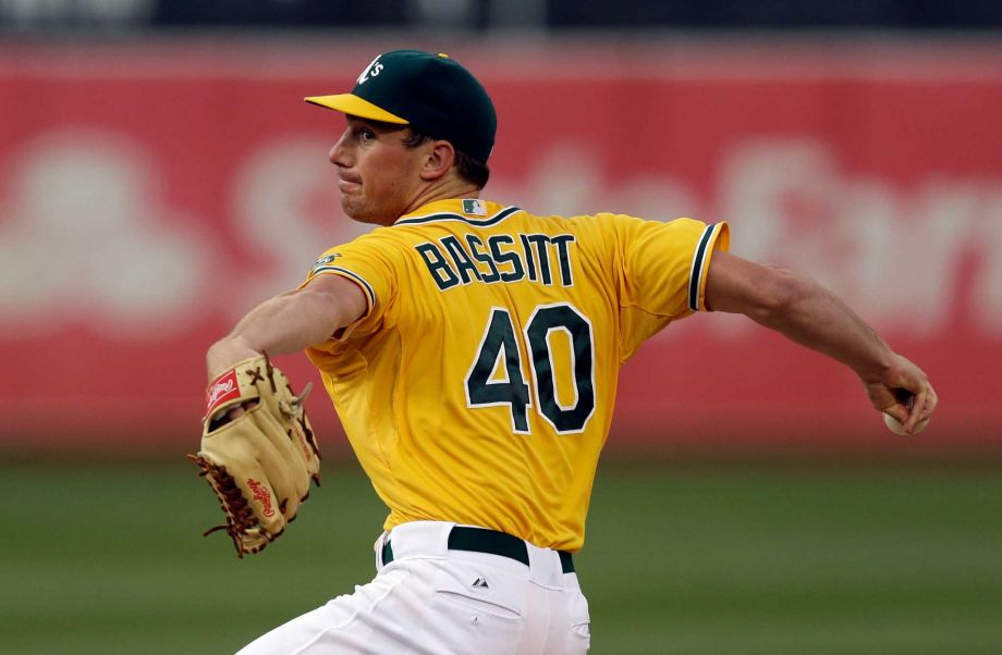 Oakland Athletics pitcher Chris Bassitt works against the Cleveland Indians in the first inning of a baseball game Thursday