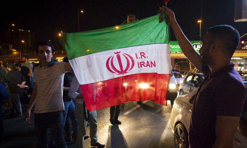 Iranians celebrate on the streets following a nuclear deal with major powers in Tehran