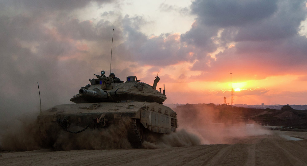 An Israeli Merkava tank rolls back from the Gaza Strip to an army deployment near Israel's border with the Palestinian enclave