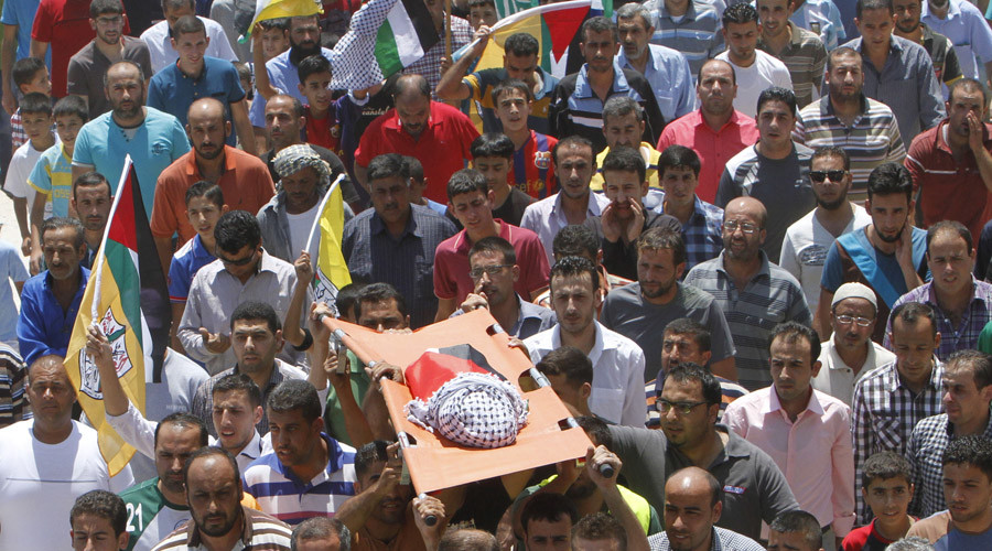 Mourners carry the body of 18-month-old Palestinian baby Ali Dawabsheh who was killed after his family's house was set on fire in a suspected attack by Jewish extremists in Duma village near the West Bank city of Nablus