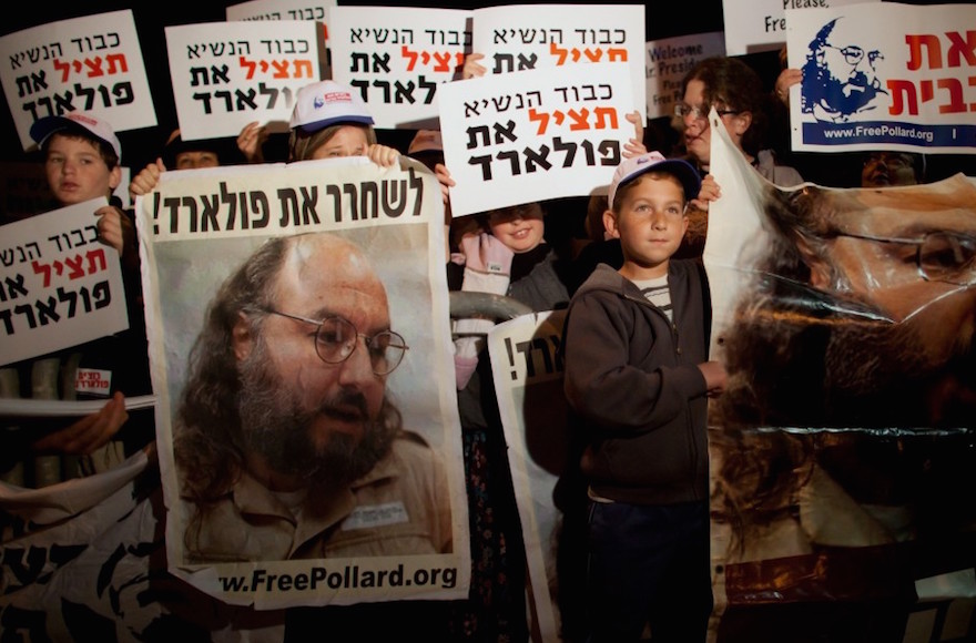 Israelis calling for the release of convicted spy Jonathan Pollard during President Obama's visit to Jerusalem in 2013