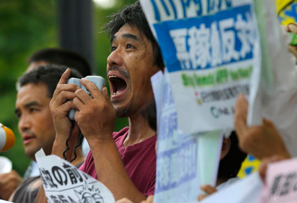 Japan restarts nuke reactor amid protest