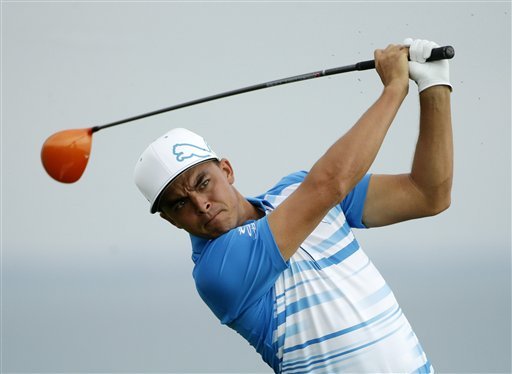 Rickie Fowler hits a drive on the 16th hole during the first round of the PGA Championship golf tournament Thursday Aug. 13 2015 at Whistling Straits in Haven Wis