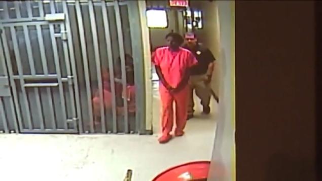 Sandra Bland walks through Waller County Jail in a newly released video as Texas authorities continue to battle skepticism about her death