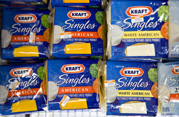 Kraft Singles sit on display in a supermarket in New York U.S. on Monday Aug. 3 2009. Kraft Foods Inc. said a unit elected to redeem some debentures early and expects to record a $14 million loss on the transaction according to a regulatory filing