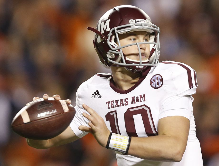 Texas A&M quarterback Kyle Allen sets back to throw the ball against Auburn during the second half of an NCAA college football game in Auburn Ala