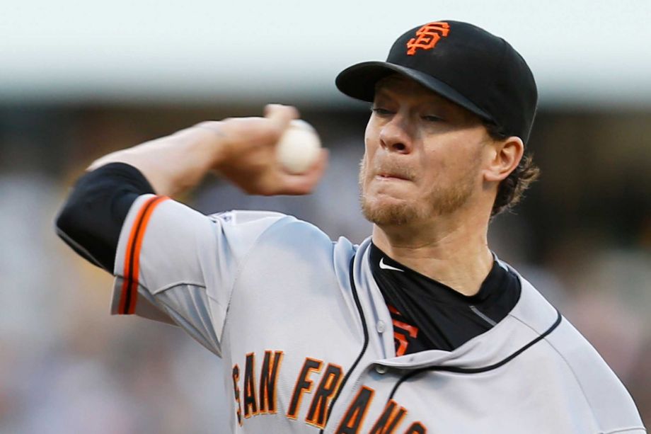 San Francisco starting pitcher Jake Peavey throws against the Pittsburgh Pirates during the first inning of a baseball game