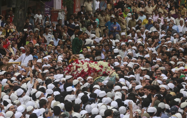 People carry the body of Yakub Memon by his family home at his Mumbai funeral yesterday