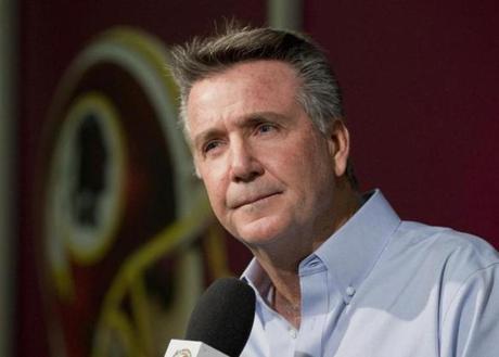 Washington Redskins President and General Manager Bruce Allen speaks to reporters during an NFL football news conference at the Redskins Park in Ashburn Va. Allen says the Washington Redskins will not reconsider