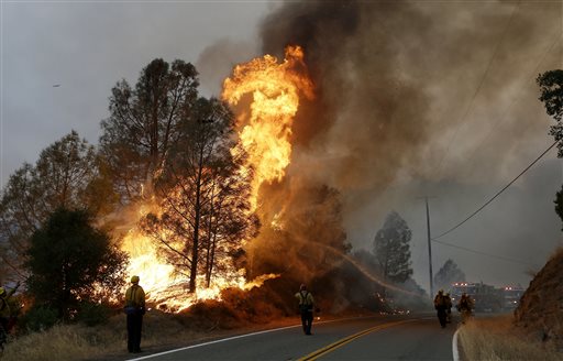 A series of wildfires were intensified by dry vegetation triple-digit temperatures and gusting winds