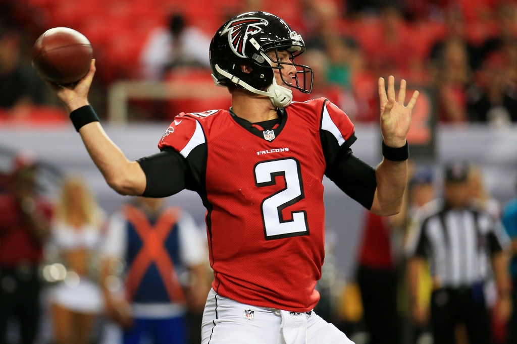 ATLANTA GA AUGUST 14 Matt Ryan #2 of the Atlanta Falcons drops back to pass in the first half of a preseason game against the Tennessee Titans at the Georgia Dome