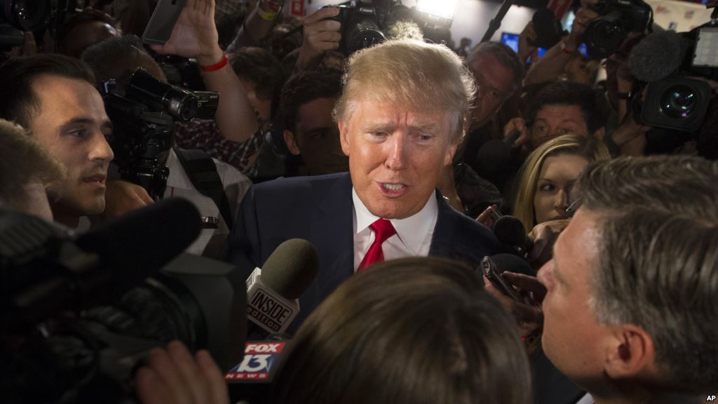 FILE- Republican presidential candidate Donald Trump speaks to reporters after the first Republican presidential debate at the Quicken Loans Arena in Cleveland Aug. 6 2015