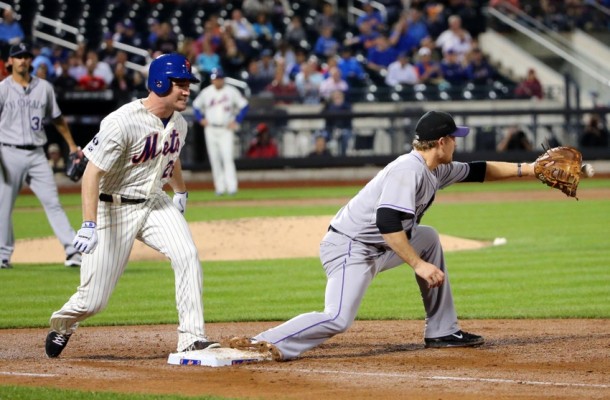 New York NY USA New York Mets second baseman Daniel Murphy reaches on an infield single as Colorado Rockies first baseman Justin Morneau is late with the tag during the third inning at Citi Field Mandatory Credit Anthony Grupp