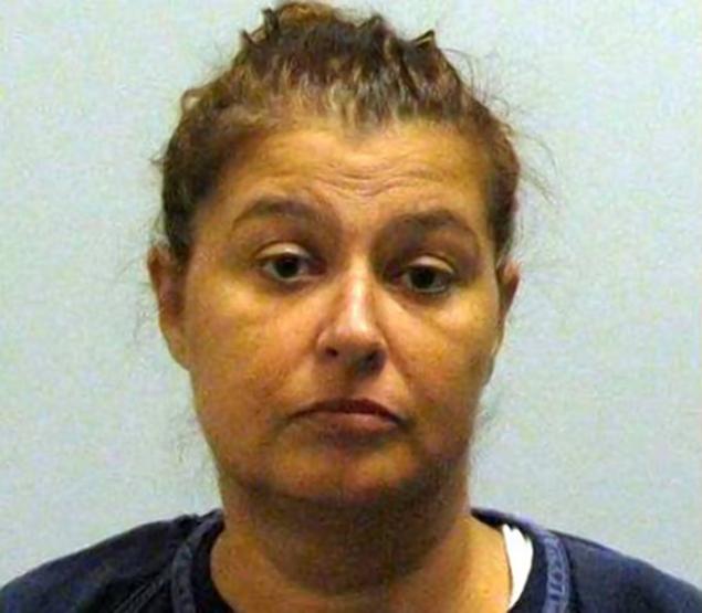 Rena Mae Giancherio 46 of Farmington Minnesota has been charged with drunken driving after allegedely driving while her 8 year old daughter clung to the outside of the car