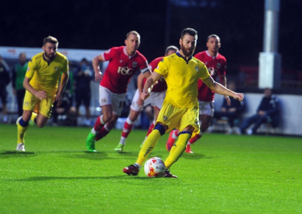 Mirco Antenucci takes the penalty from which he put Leeds United into the lead at Bristol City