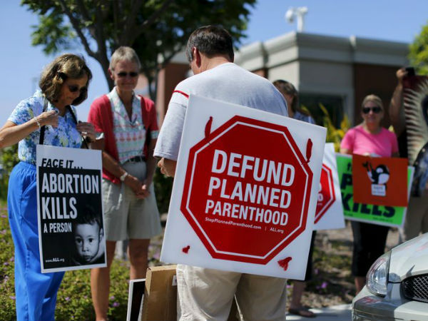 Protesters gather outside a Planned Parenthood clinic in Vista California