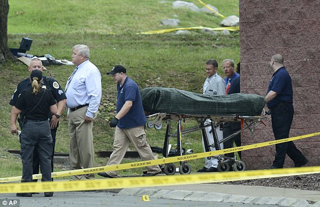 US cinema shooting: Suspect shot dead after opening fire on police