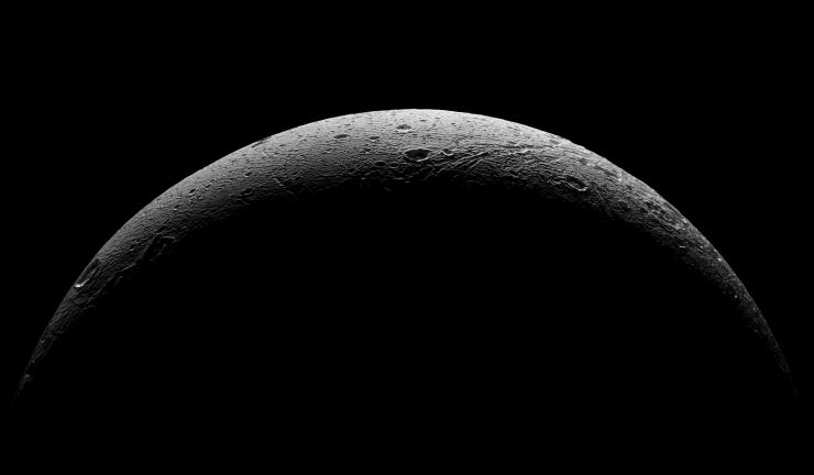 NASA's Cassini Spacecraft Captures Breathtaking Images Of Saturn's Moon Dione