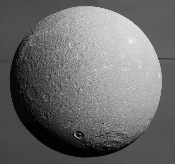 NASA's Cassini Spacecraft Captures Breathtaking Images Of Saturn's Moon Dione