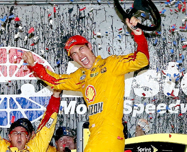 NASCAR Logano fights off Harvick to win at Bristol