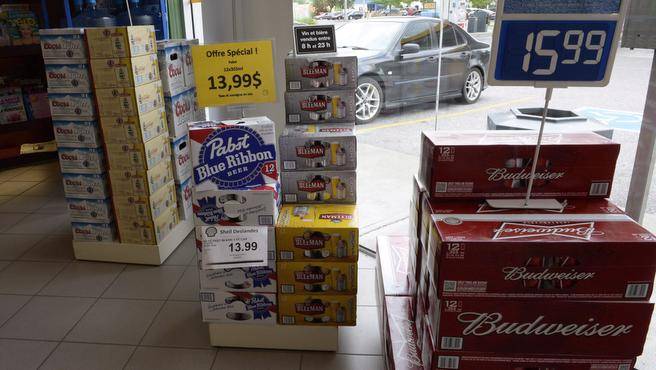 Beer is on display inside a store in Drummondville Que. on July 23. A hearing over a New Brunswick man’s bid to bring beer home from Quebec continues in court today