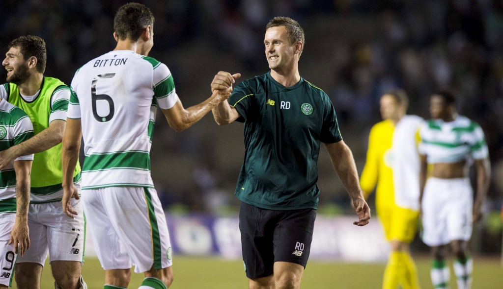 Nir Bitton celebrates with manager Ronny Deila after the goal-less draw with Qarabag in Baku