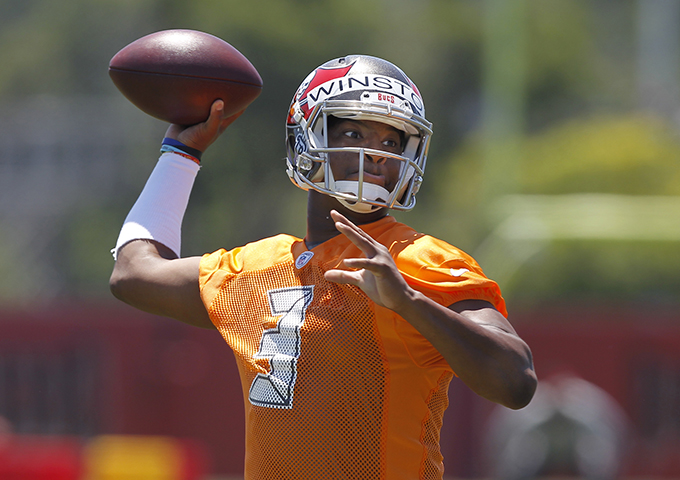 Tampa Bay Buccaneers quarterback Jameis Winston reacts after missing a spare during a bowling tournament between the Buccaneers rookies and Tampa Fire Rescue rookies Tuesday