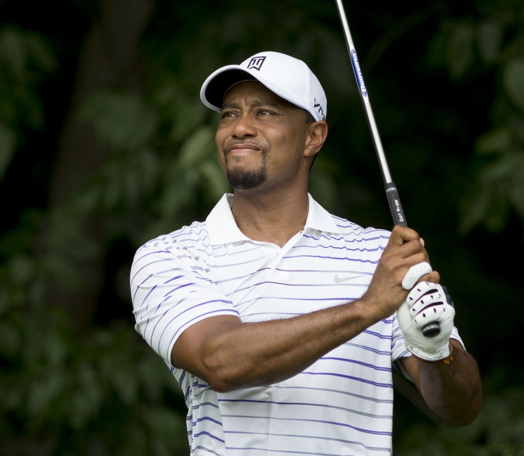 SHEBOYGAN WI- AUGUST 14 Tiger Woods of the United States writes in his scorecard on the 9th hole during the second round of the 2015 PGA Championship at Whistling Straits