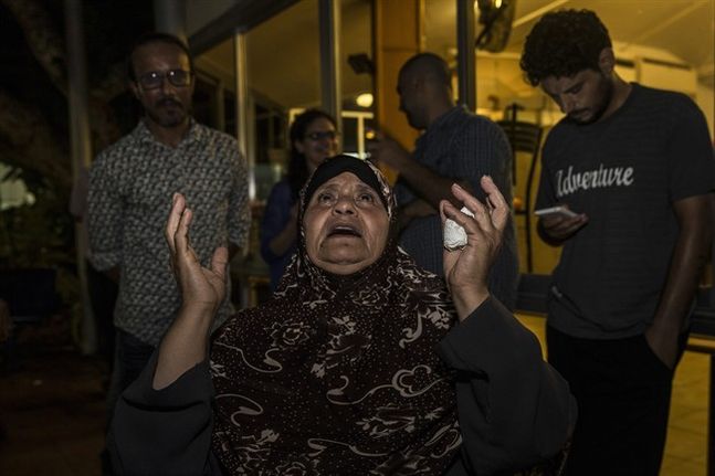 Mazoza Allan mother of Palestinian hunger striker Mohammed Allan reacts to a Supreme Court decision outside Barzilai hospital in Ashkelon southern Israel Wednesday Aug. 19 2015. Israel's Supreme Court on Wednesday suspended the detention order for A