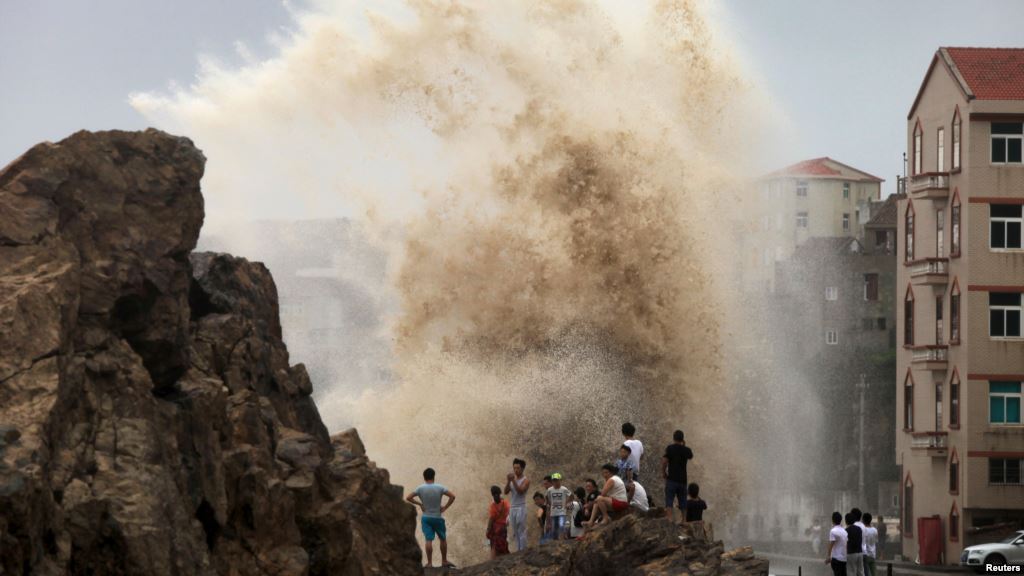 People look at waves as Typhoon Soudelor approaches China in Taizhou Zhejiang province Aug. 8 2015