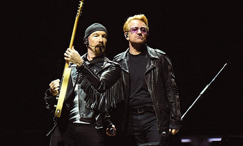 Paul Simon joins U2 onstage in NYC; responders to Bono's bike accident sit in