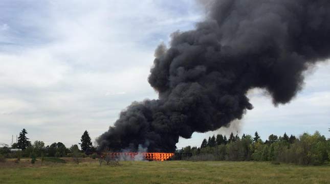 Sherwood businesses evacuate, road closes due to trestle fire