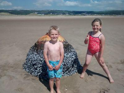 Father lets children play with beach 'buoy&#039, discovers it was a bomb