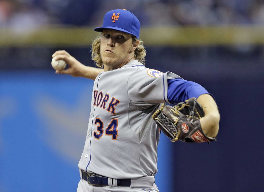 New York Mets starting pitcher Noah Syndergaard delivers to the Tampa Bay Rays during the first inning of an interleague baseball game Saturday Aug. 8 2015 in St. Petersburg Fla