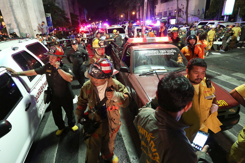 Rescue workers arrive to assist after an explosion hit Bangkok Thailand on Monday