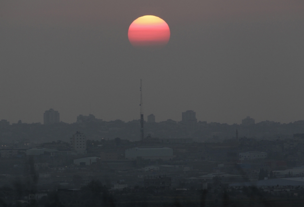 ReutersThe sun sets over the northern Gaza Strip