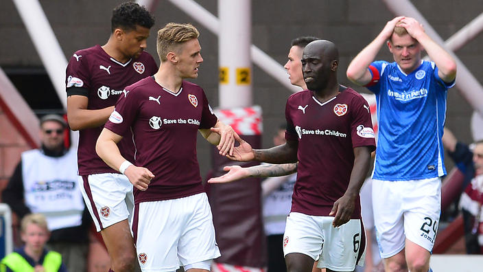 Sam Nicholson is congratulated after netting Hearts's winner      
        
            
    
               Show Grid