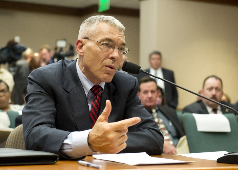 DPS Director Col. Steve Mc Craw answers questions from State Rep. Garnet Coleman during invited testimony of the House Committee on County Affairs investigating the Sandra Bland death in Waller County