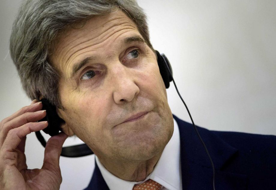 U.S. Secretary of State John Kerry listens to an interpreter during a press conference following a meeting with foreign ministers of the Gulf Cooperation Council on Monday Aug. 3 2015 in Doha. Qatari Foreign Minister Khaled al Attiyah on Monday