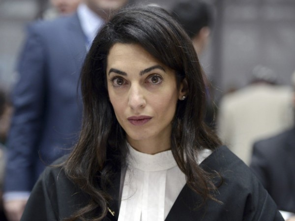 Amal Ramzi Clooney is a London-based Lebanese British lawyer activist and author. She specializes in international law criminal law human rights and extradition