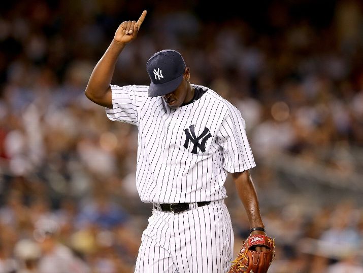 Luis Severino #40 of the New York Yankees celebrates his final out of the fifth inning against the Boston Red Sox