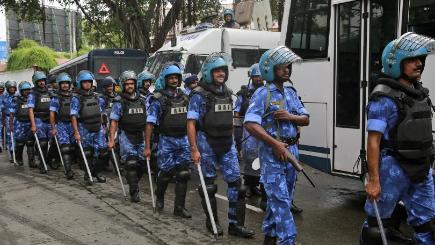 Soldiers patrol in the neighbourhood of Yakub Abdul Razak Memon's family residence in Mumbai India