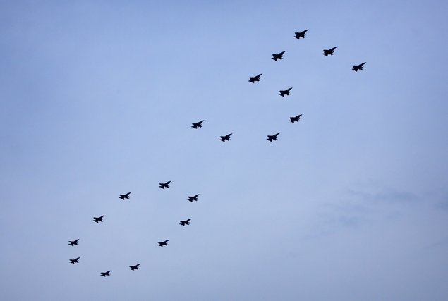 Singapore air force F-16s fly in a “50” formation Sunday as part of celebrations for the nation’s 50th year of independence