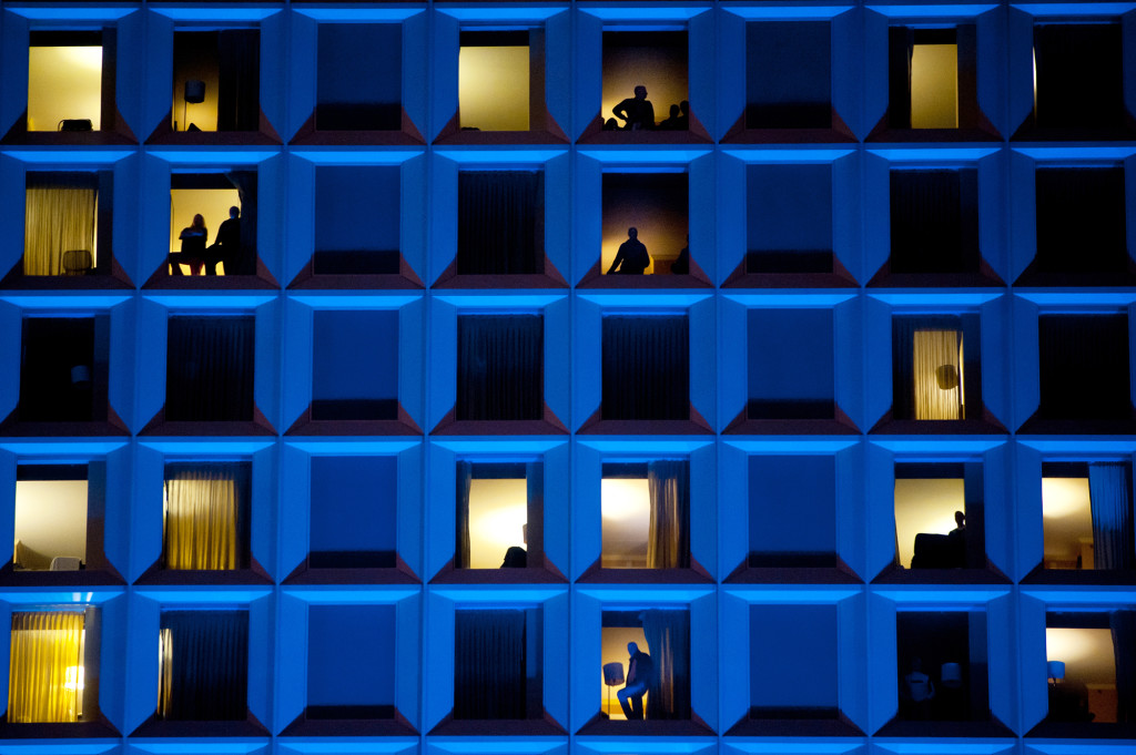 Slide 1  of 1		.		
		
			Caption
			Guests look out from inside their rooms in the Wyndham Hotel in Pittsburg. Stephanie Strasburg  Tribune Review  AP