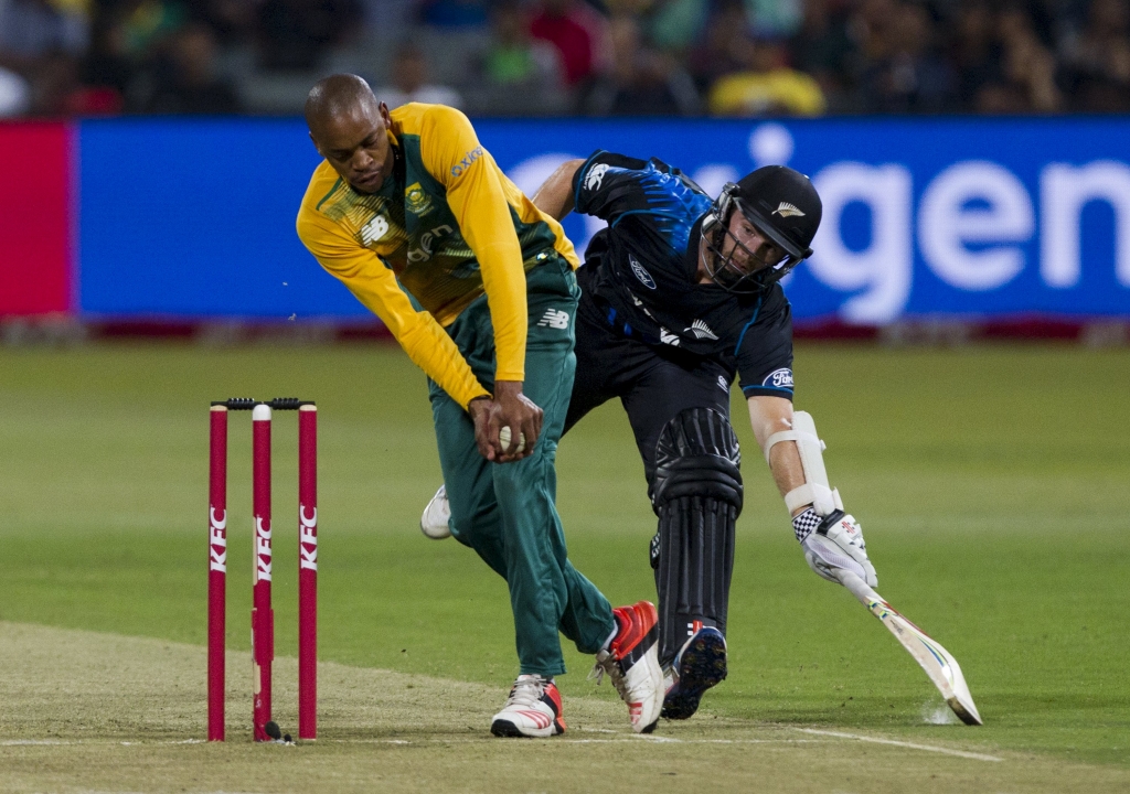 New Zealand's Kane Williamson gets his bat over the crease before South Africa's Aaron Phangiso can run him out during their T20 International cricket match in Durban