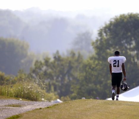 Northwestern football player Justin Jackson walks to practice