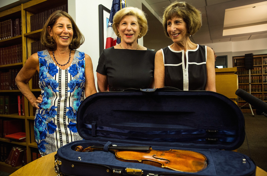 Jill Totenberg Nina Totenberg and Amy Totenberg viewing their father's Stadivarius violin which was stolen after a concert 35 years ago at an FBI press conference announcing the recovery of the violin on Aug. 6 2015 in New York. (Andrew Burton  Getty