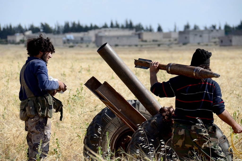 Samiyye Front rebels loading mortar rounds