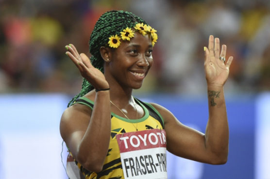 The double Olympic champion clocked 10.76 seconds to win easily in Beijing