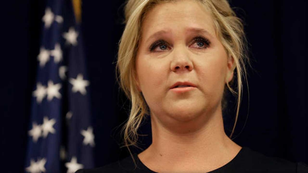 The issue of gun violence became'extremely personal for Amy Schumer the comedian said on July 23